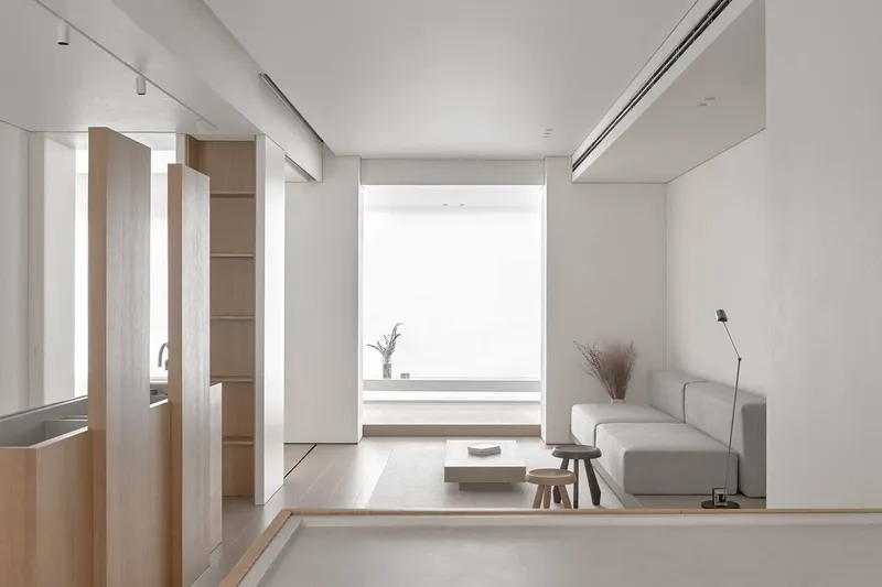 Black Forest Apartment – Flexible Suite Layout with Flowing Space by MANN Architects